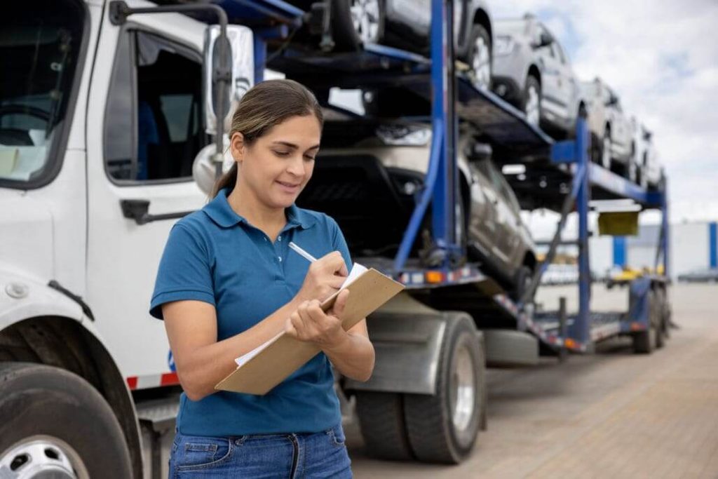 woman count shipping cars on paper